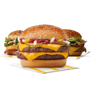 Tres hamburgueses en fila on la del mig es veu per davant de les dues a l'extrem i és més gran