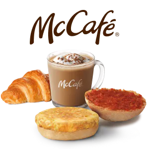 Un got de cafè amb el text de McCafé al got inscrit, dos pans un amb truita i un altre amb tomàquet i un croissant