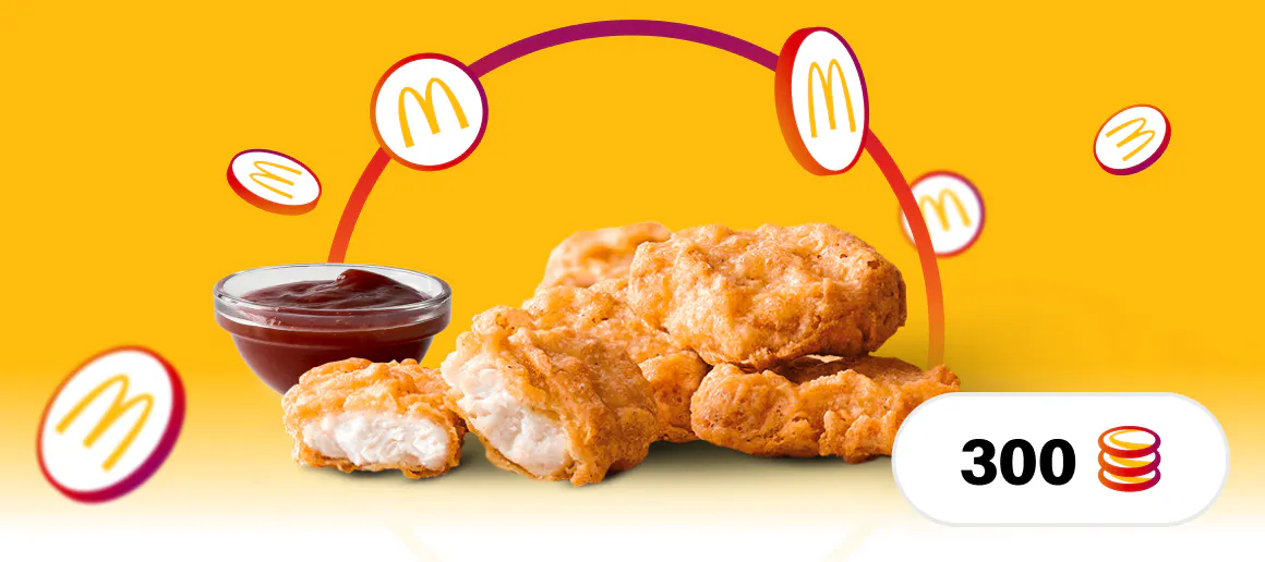 McDonalds-eko nuggets baten irudia hondo horian kokatuta dagoen MyMcDonalds logotipoa duten txanponak eta beheko eskuinaldean 300 zenbakia eta txanpon ikonoa dituen ikonoa.